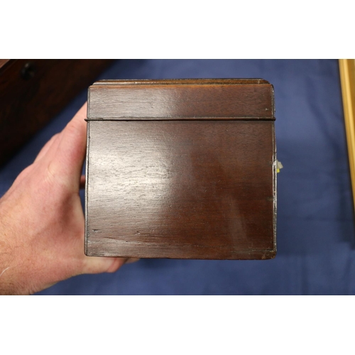 163 - Antique mahogany hinge top tea caddy, the lid opening to reveal a sectioned interior with two white ... 