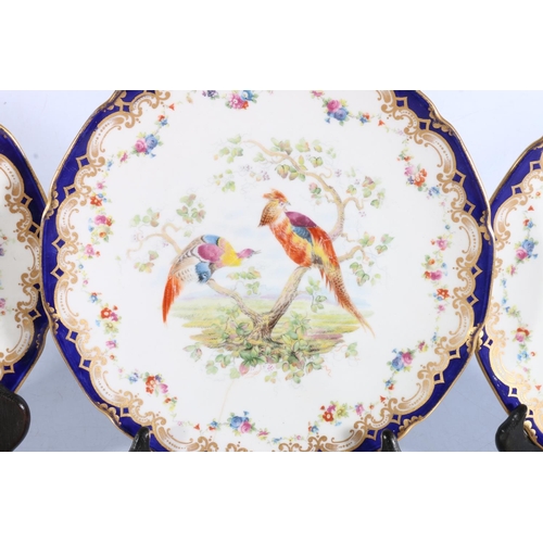 116 - Royal Doulton, a set of six porcelain cabinet plates decorated with birds of paradise central vignet... 