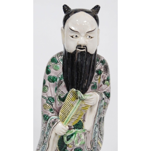 252 - Chinese famille verte pottery figure modelled as an Immortal, fixed to a famille rose base, 32.5cm h... 