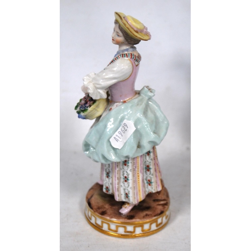 229 - Near pair of Meissen-style continental porcelain figures modelled as a couple holding baskets of flo... 