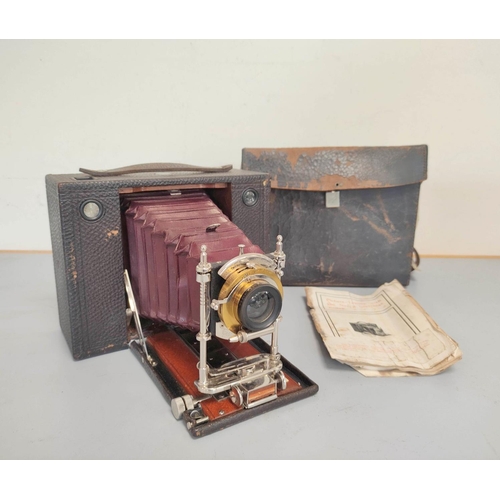 449 - Antique late Victorian Kodak Eastman No 4 model E folding box cartridge camera with red leather bell... 