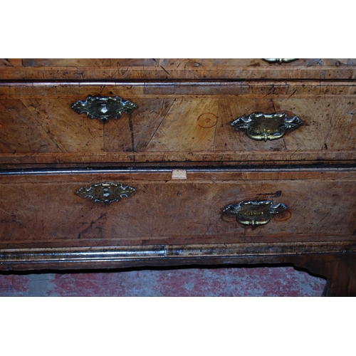 373 - Mid-18th century walnut bureau, the fall front enclosing drawers and pigeon holes, above four gradua... 