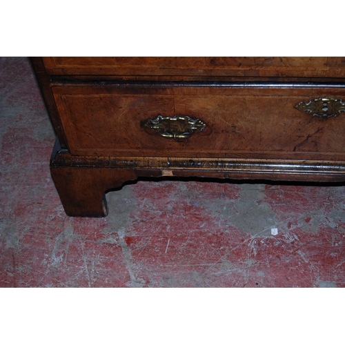 373 - Mid-18th century walnut bureau, the fall front enclosing drawers and pigeon holes, above four gradua... 