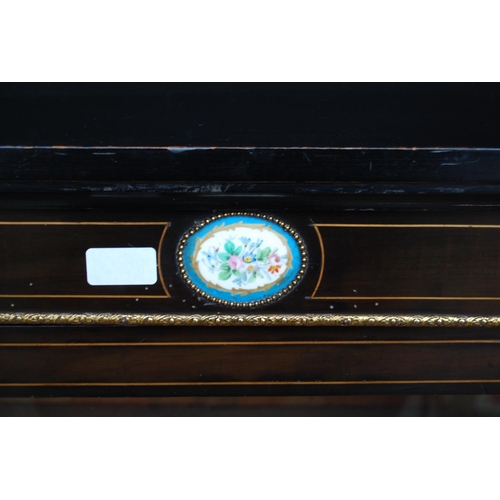 374 - Victorian style ebonised pier cabinet, the glazed door enclosing shelves, decorated with Sèvres-styl... 