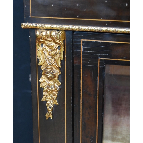 374 - Victorian style ebonised pier cabinet, the glazed door enclosing shelves, decorated with Sèvres-styl... 