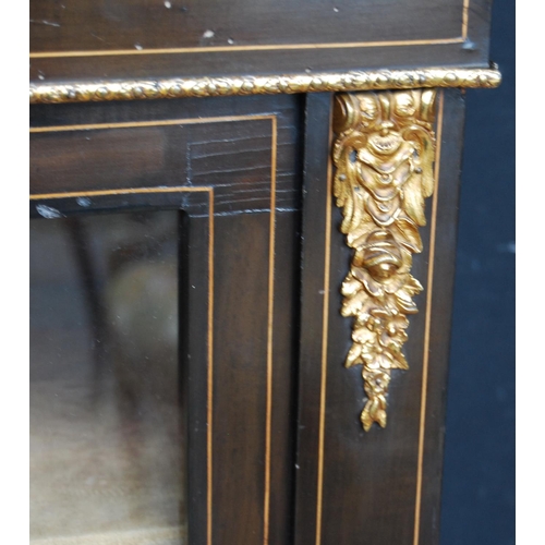 374 - Victorian style ebonised pier cabinet, the glazed door enclosing shelves, decorated with Sèvres-styl... 