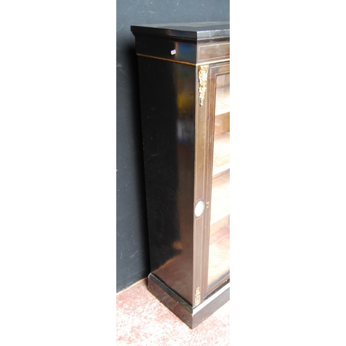 374 - Victorian style ebonised pier cabinet, the glazed door enclosing shelves, decorated with Sèvres-styl... 