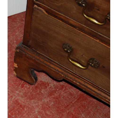 375 - Composite mahogany bureau bookcase, the Edwardian bookcase top with dentil decoration above two astr... 