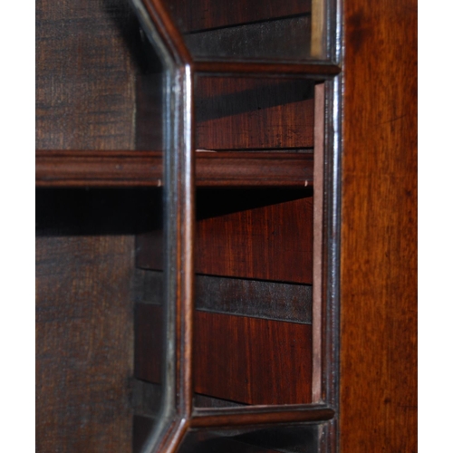 375 - Composite mahogany bureau bookcase, the Edwardian bookcase top with dentil decoration above two astr... 