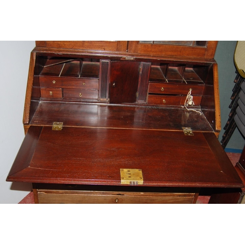 375 - Composite mahogany bureau bookcase, the Edwardian bookcase top with dentil decoration above two astr... 