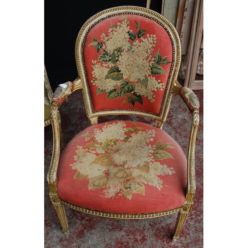 377 - Pair of near-matching Louis XV style giltwood and painted fauteuils, upholstered in non-matching flo... 