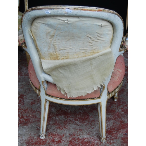 377 - Pair of near-matching Louis XV style giltwood and painted fauteuils, upholstered in non-matching flo... 