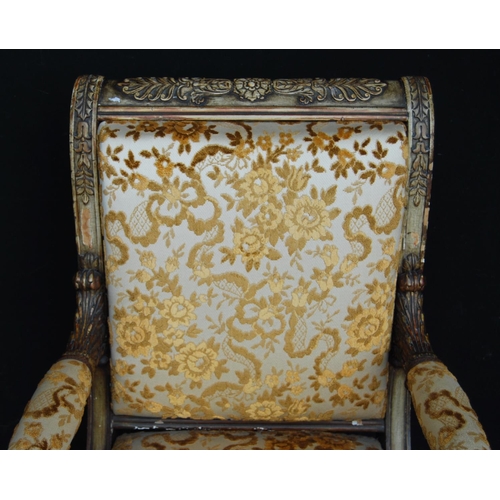 382 - Victorian-style painted wood armchair decorated with masks, acanthus and floral mouldings, upholster... 