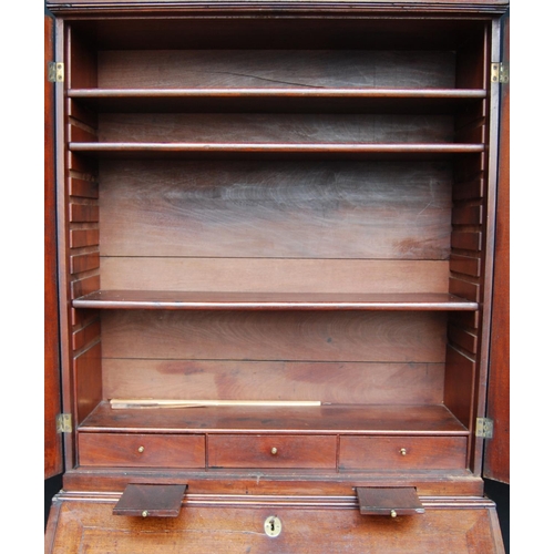 383 - Georgian mahogany bureau cabinet, the cabinet top with two panelled doors enclosing shelves, above a... 