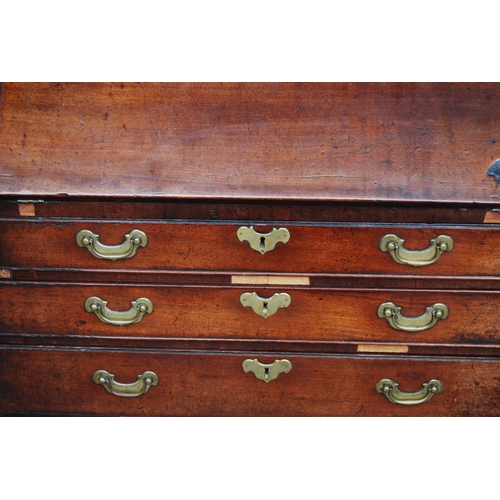 383 - Georgian mahogany bureau cabinet, the cabinet top with two panelled doors enclosing shelves, above a... 