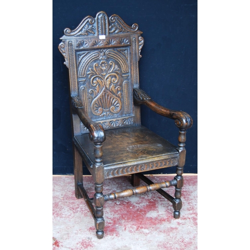 384 - 18th century-style Wainscot oak armchair, the scroll top above floral panels, acanthus moulded armre... 