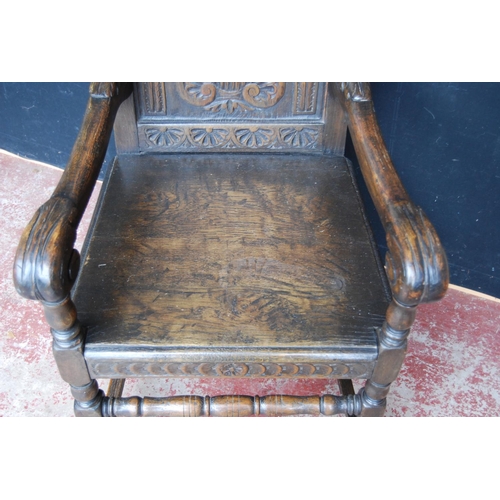 384 - 18th century-style Wainscot oak armchair, the scroll top above floral panels, acanthus moulded armre... 