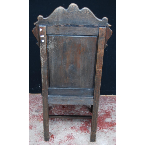 384 - 18th century-style Wainscot oak armchair, the scroll top above floral panels, acanthus moulded armre... 