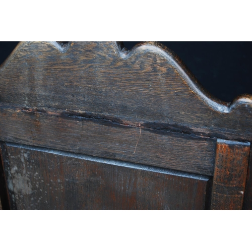 384 - 18th century-style Wainscot oak armchair, the scroll top above floral panels, acanthus moulded armre... 