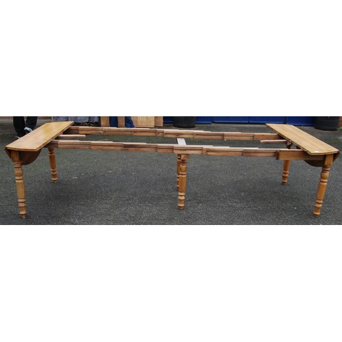 386 - French walnut extending dining table, with four additional leaves, on six turned supports, 67cm wide... 