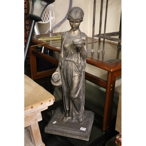 473 - Composite garden statue of a women with water ewer, 73cm tall. 