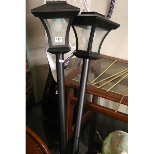 477 - Pair of garden lights in the form of street lampposts, 167cm tall.