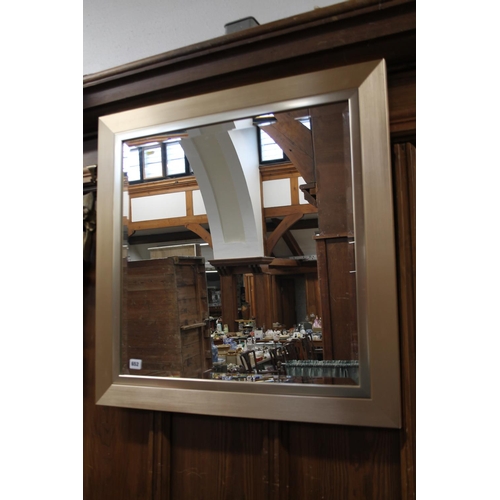 652 - Bevel edged square wall mirror, 75cm wide.