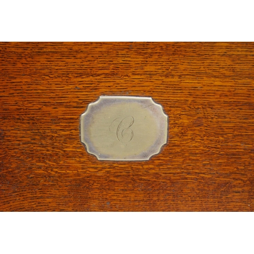 175 - Oak galleried serving tray with silver plated gallery rail and handles, monogrammed cartouche to the... 