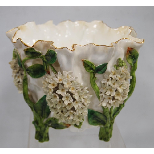 230 - Moore Brothers porcelain planter with a frilly gilded rim above encrusted flowers, leaves and vines,... 