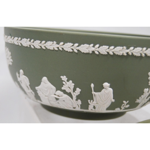 233 - Three pieces of Wedgwood green Jasper ware comprising a bowl, jug and oval dish, all decorated with ... 