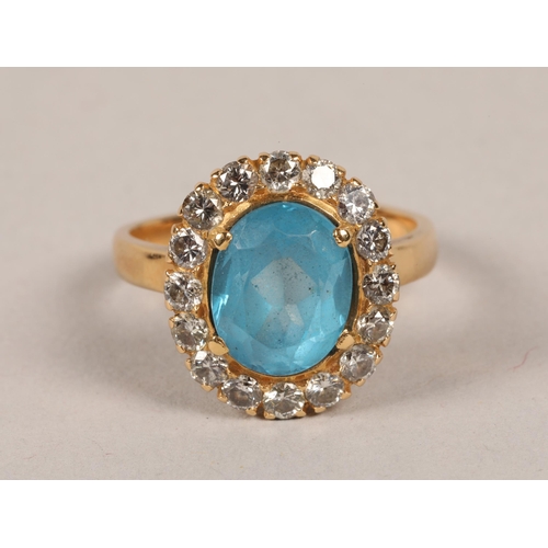105 - Diamond and aquamarine  ring set on an unmarked yellow metal band; gross weight 6.1g