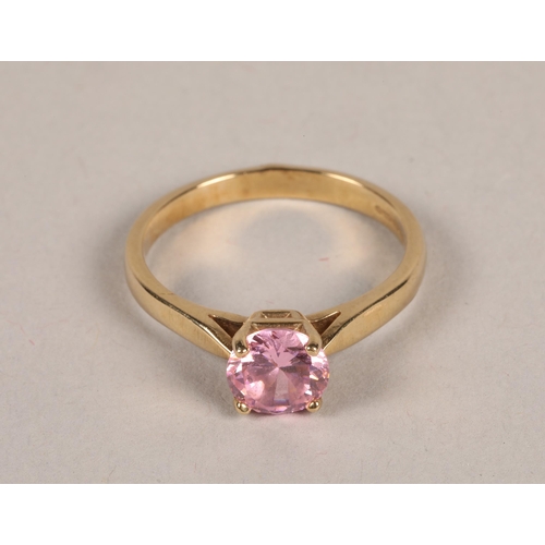 123 - 9 carat yellow and pink stone set ring; gross weight 3.1g