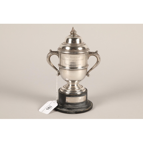 162 - George V hallmarked silver twin handled trophy; 15cm high; gross weight 224g