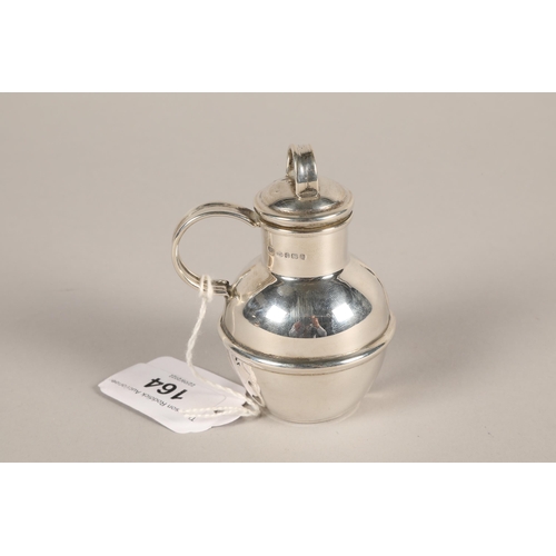 164 - A contemporary hallmarked silver Guernsey jug; 9cm high; 64.8g gross weight