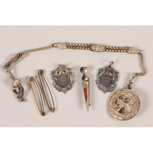 69 - Two silver sporting medals; together with assorted chains and brooches