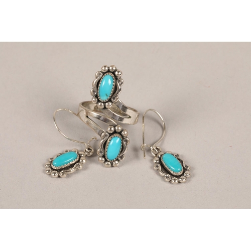 89 - Suite of silver and turquoise jewellery comprising a ring and matching earrings; 4.1g gross weight