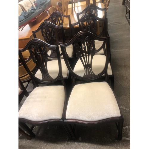 633 - Set of six mahogany shield backing dining chairs