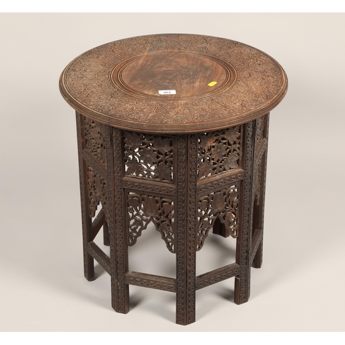 463 - Carved Indian table on octagonal base