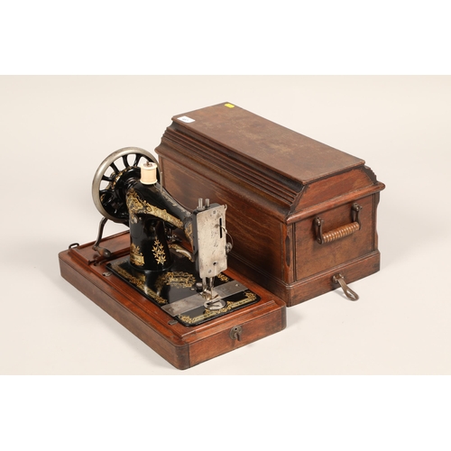 487 - Cased Singer sewing machine