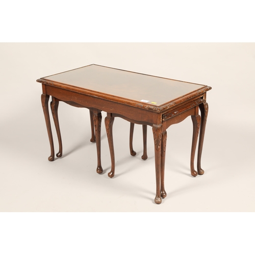 522 - Nest of three mahogany intersliding tables