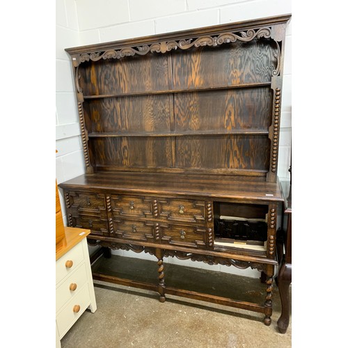 629 - 20th century oak kitchen dresser with plate rack back