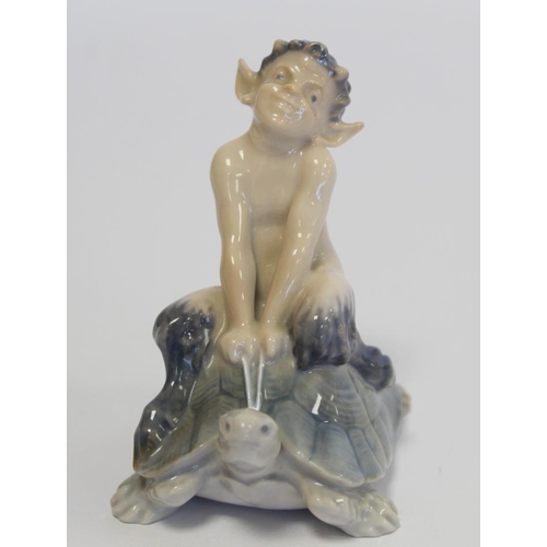 201 - Royal Copenhagen porcelain figure of a faun riding a tortoise, no. 858, 1923 underglaze mark with bl... 