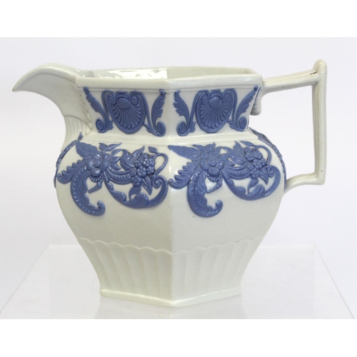 207 - Early Victorian moulded jug of hexagonal baluster form, the white stoneware body with applied blue, ... 