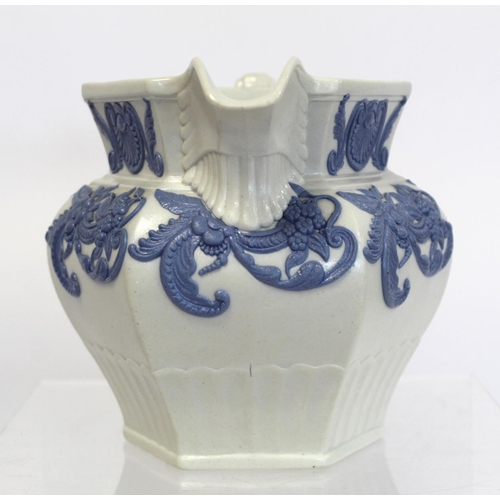 207 - Early Victorian moulded jug of hexagonal baluster form, the white stoneware body with applied blue, ... 