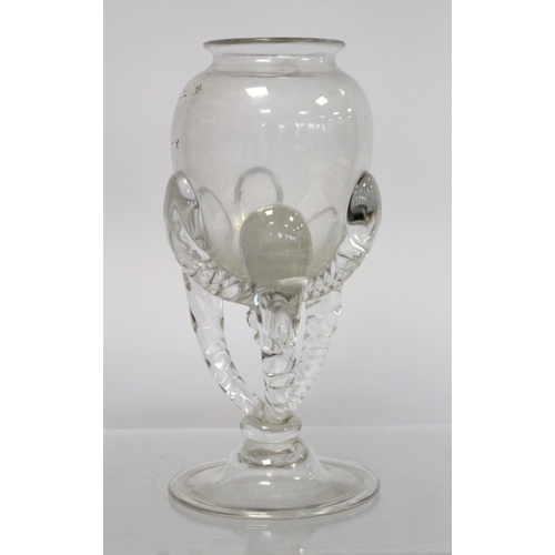 208 - An unusual antique clear glass vase in the Anglo-Saxon claw beaker style, the ovoid bowl with three ... 