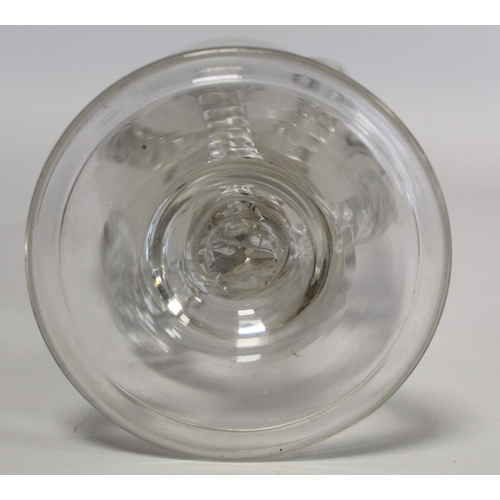 208 - An unusual antique clear glass vase in the Anglo-Saxon claw beaker style, the ovoid bowl with three ... 