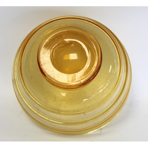 209 - Barnaby Powell for Whitefriars ribbon trailed amber glass footed bowl with polished base, 21cm diam.