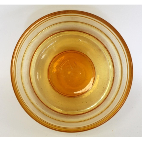 209 - Barnaby Powell for Whitefriars ribbon trailed amber glass footed bowl with polished base, 21cm diam.