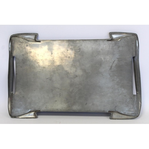 213 - Archibald Knox for Liberty & Co., London, pewter tray with twin cut-away handles and raised tend... 