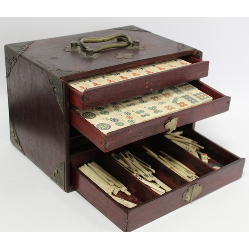 216 - 19th or early 20th century Chinese Mahjong set in wooden case, with 148 bone and bamboo tiles; also ... 